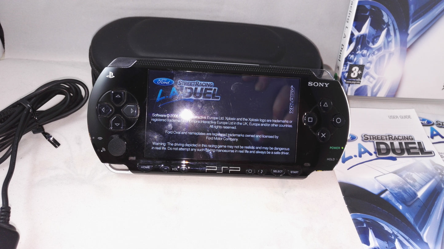 Sony Playstation Portable PSP console with charger, case and Ford Street Racing Duel