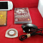 White Sony PSP 2003 Console with Resistance Retribution and 1 GB Memory Card