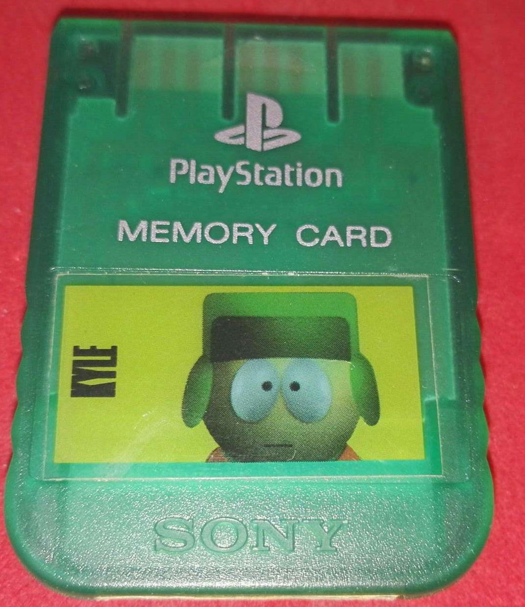 Official Playstation 1 (PS1) Crystal Green Memory Card with South Park Sticker Accessory