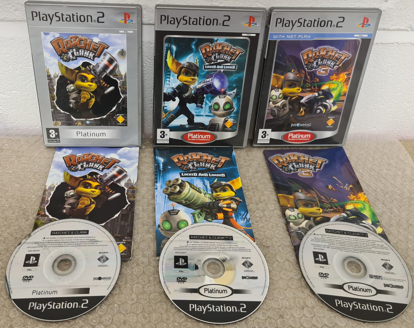 Ratchet & Clank 1 - 3 Sony Playstation 2 (PS2) Game Bundle