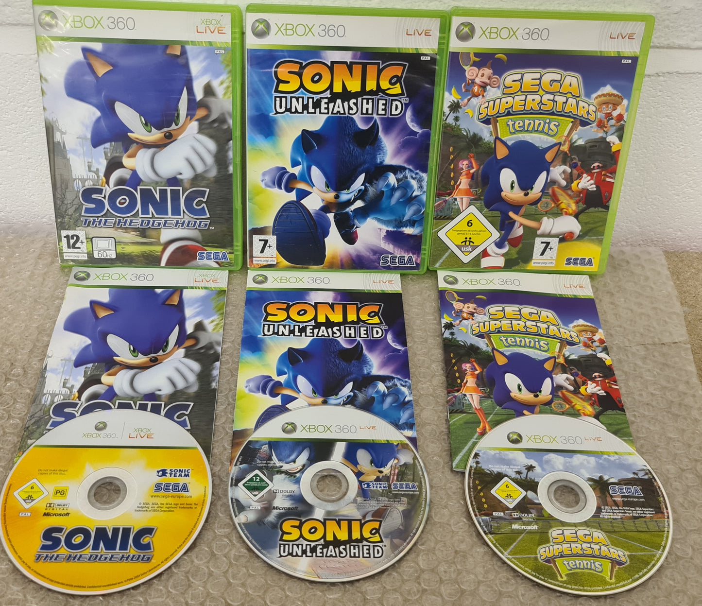 Sonic the Hedgehog, Sonic Unleashed & Sega Tennis Microsoft Xbox 360 Game Bundle