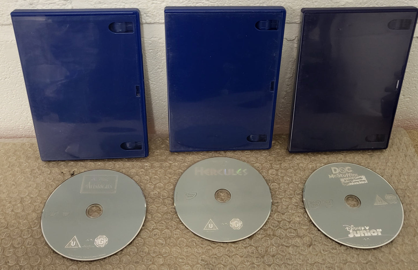 Asda Dolby DVD Player with 7 X Disney DVD's