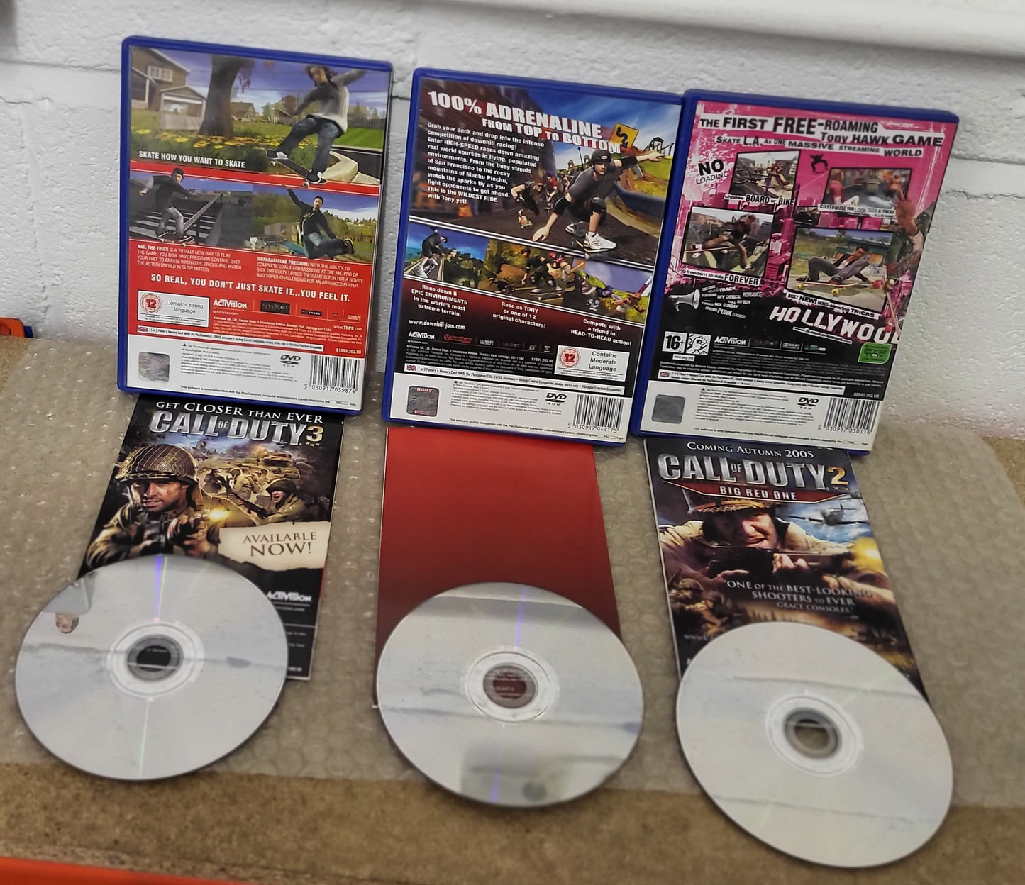 Tony Hawk's Project 8, Downhill Jam & American Wasteland Sony Playstation 2 (PS2) Game Bundle