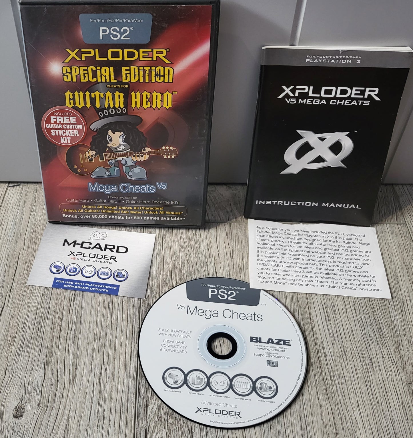 Xploder Guitar Hero Mega Cheats V5 Sony Playstation 2 (PS2) Cheat Disc