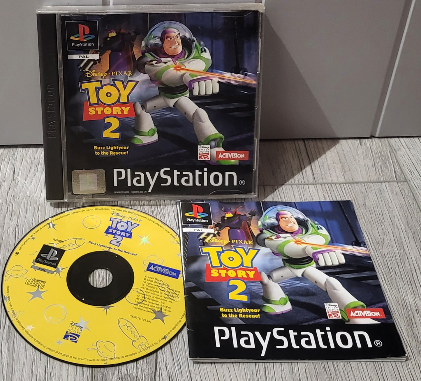 Toy Story 2 Buzz Lightyear to the Rescue Black Label Sony Playstation 1 (PS1) Game